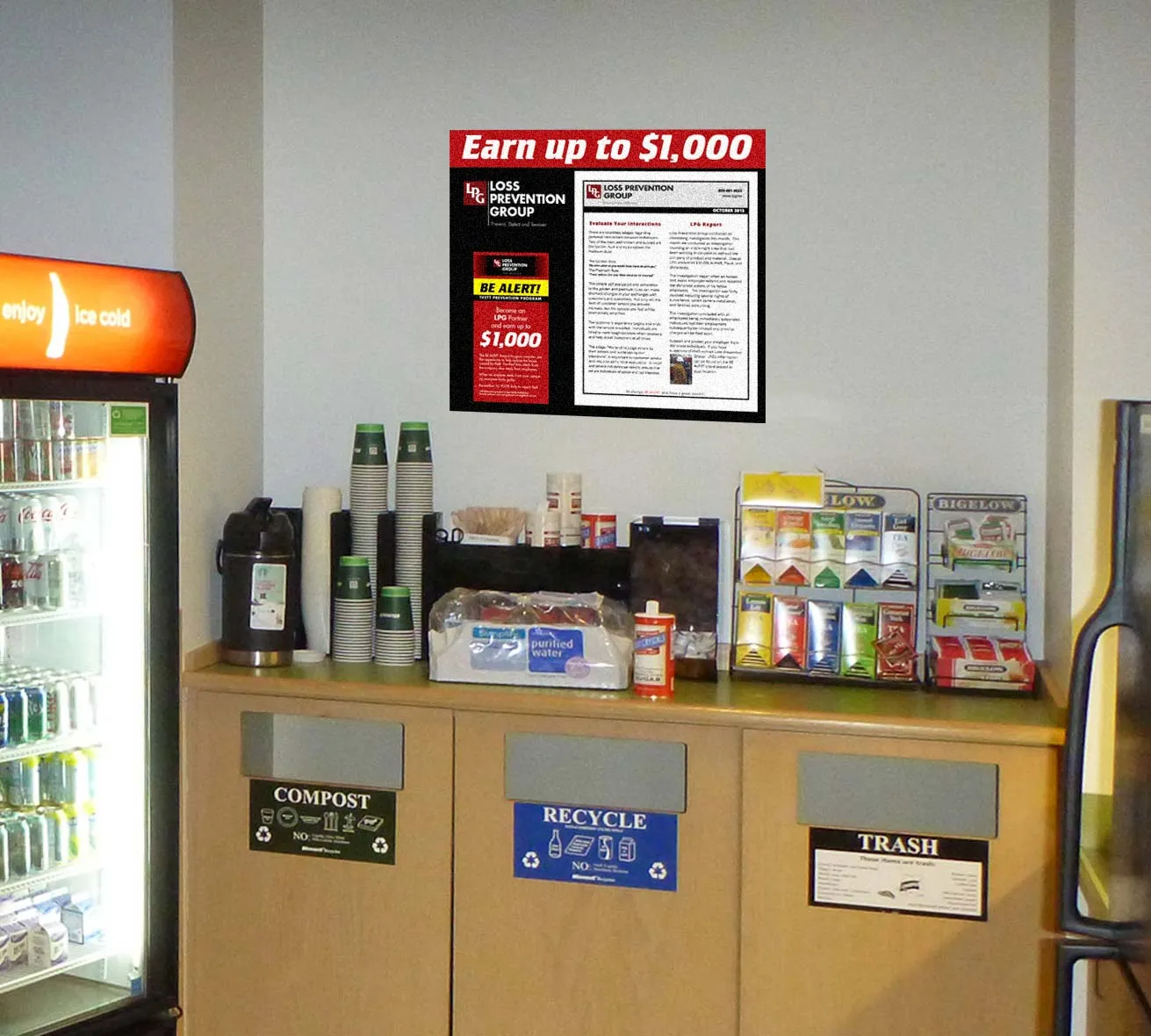A break room with the Be Alert poster on the wall